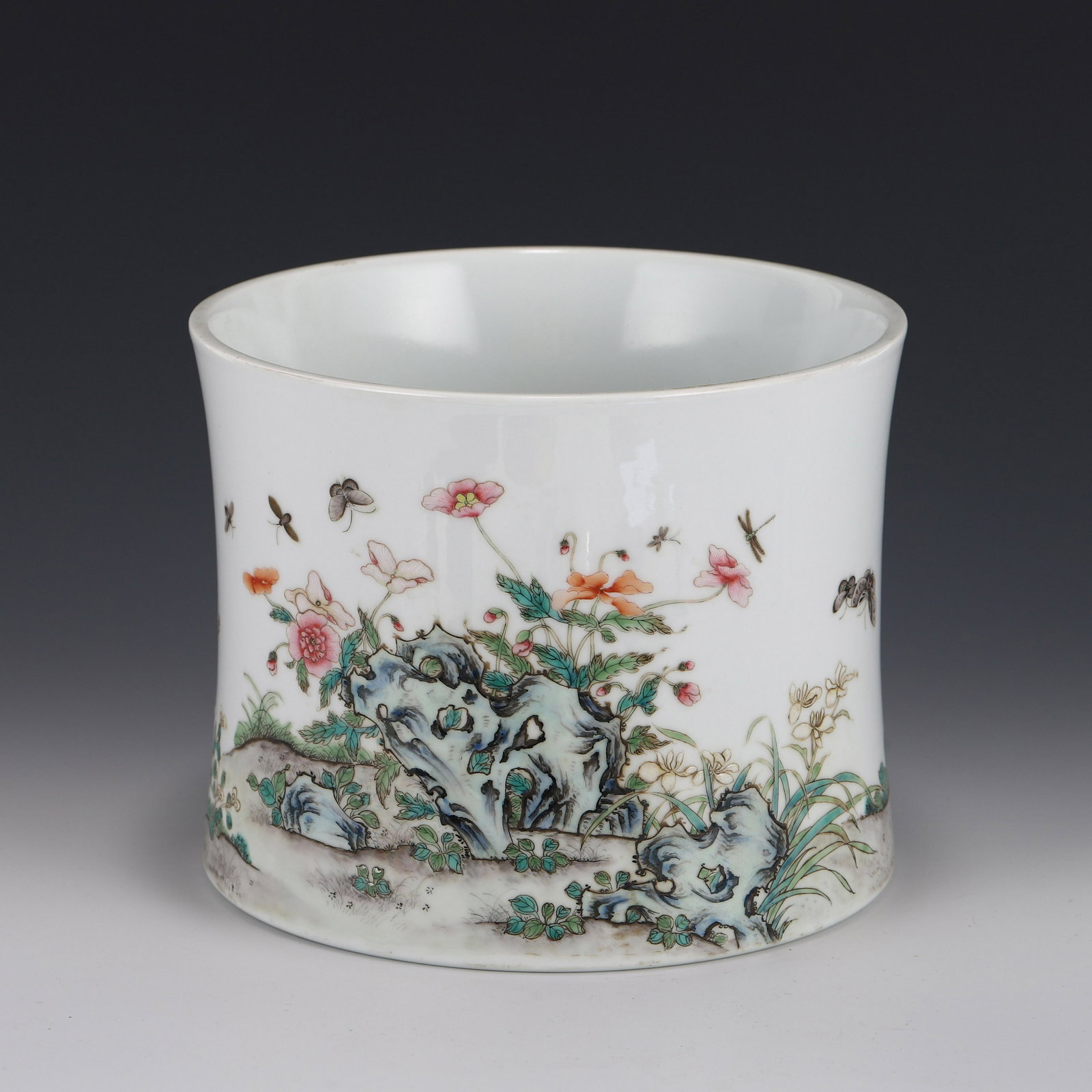 FAMILLE ROSE FLOWER BRUSH POT: Measurements: Height: 15.5 cm Diam: 19.5 cm Chinese Qing Dynasty Period, YongZheng Famille Rose flower brush pot. The Porcelain potted in brush holder shape, sturdily in cylindrical straight body, thi