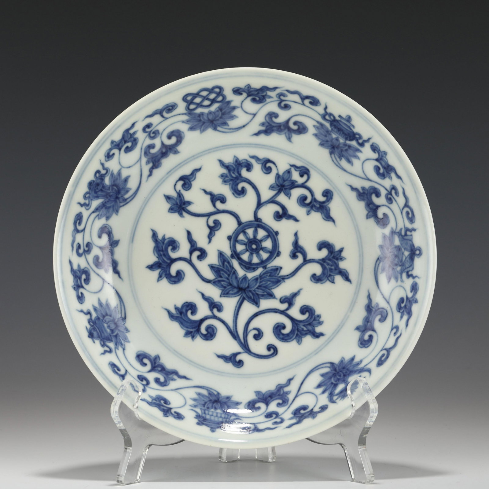 CHENGHUA BLUE & WHITE FLORI PORCELAIN PLATE: PROVENANCE: From St Matthew, Louisville, KY Private Collector. Measurements: Height: 4 cm, Diam.: 21 cm Chinese Ming Dynasty ChengHua Blue and white Flori Motif Porcelain Plate. The plate has a broad 