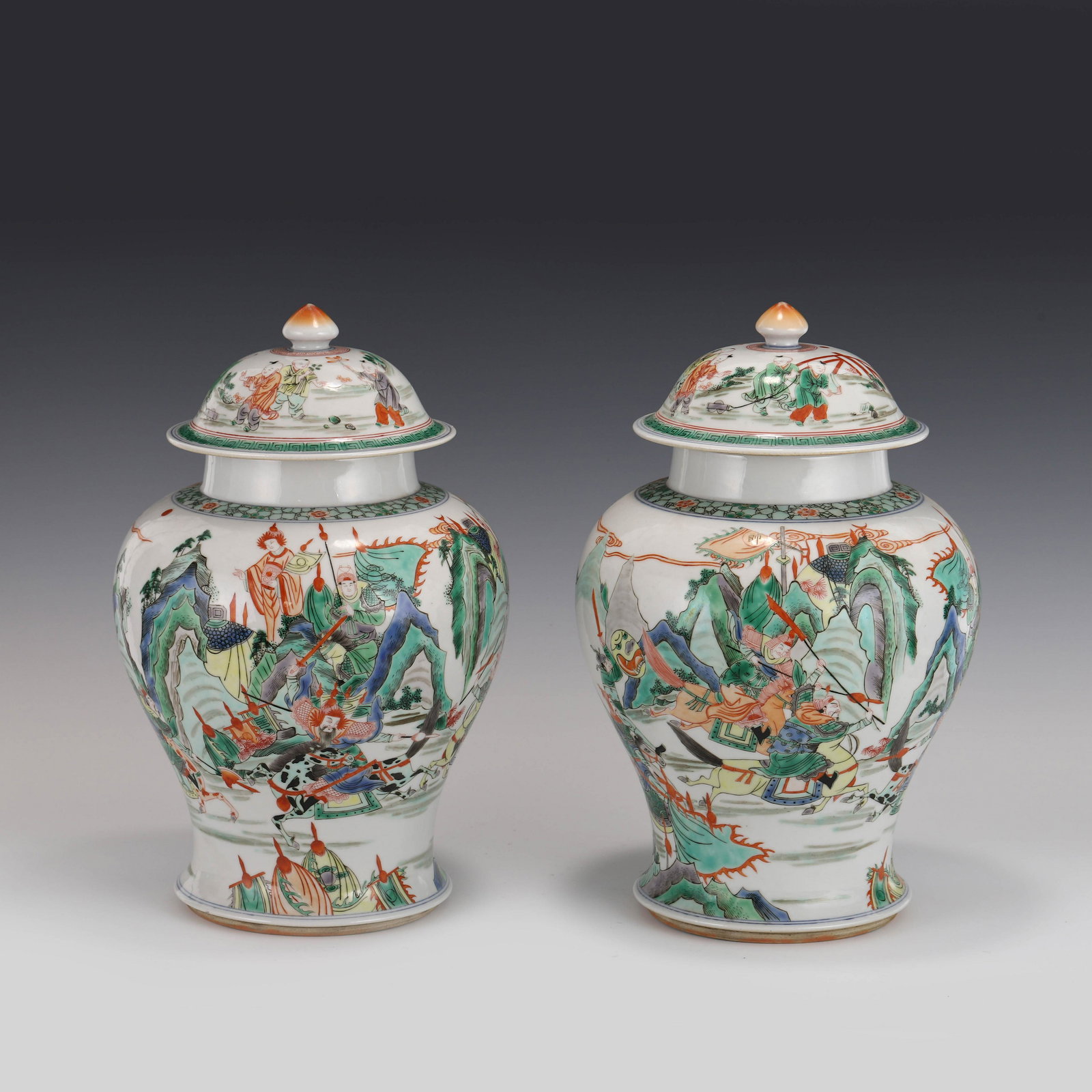 PAIR OF WUCAI BATTLE SCENE GENERAL HELMET LIDDED JARS (1 of 10)