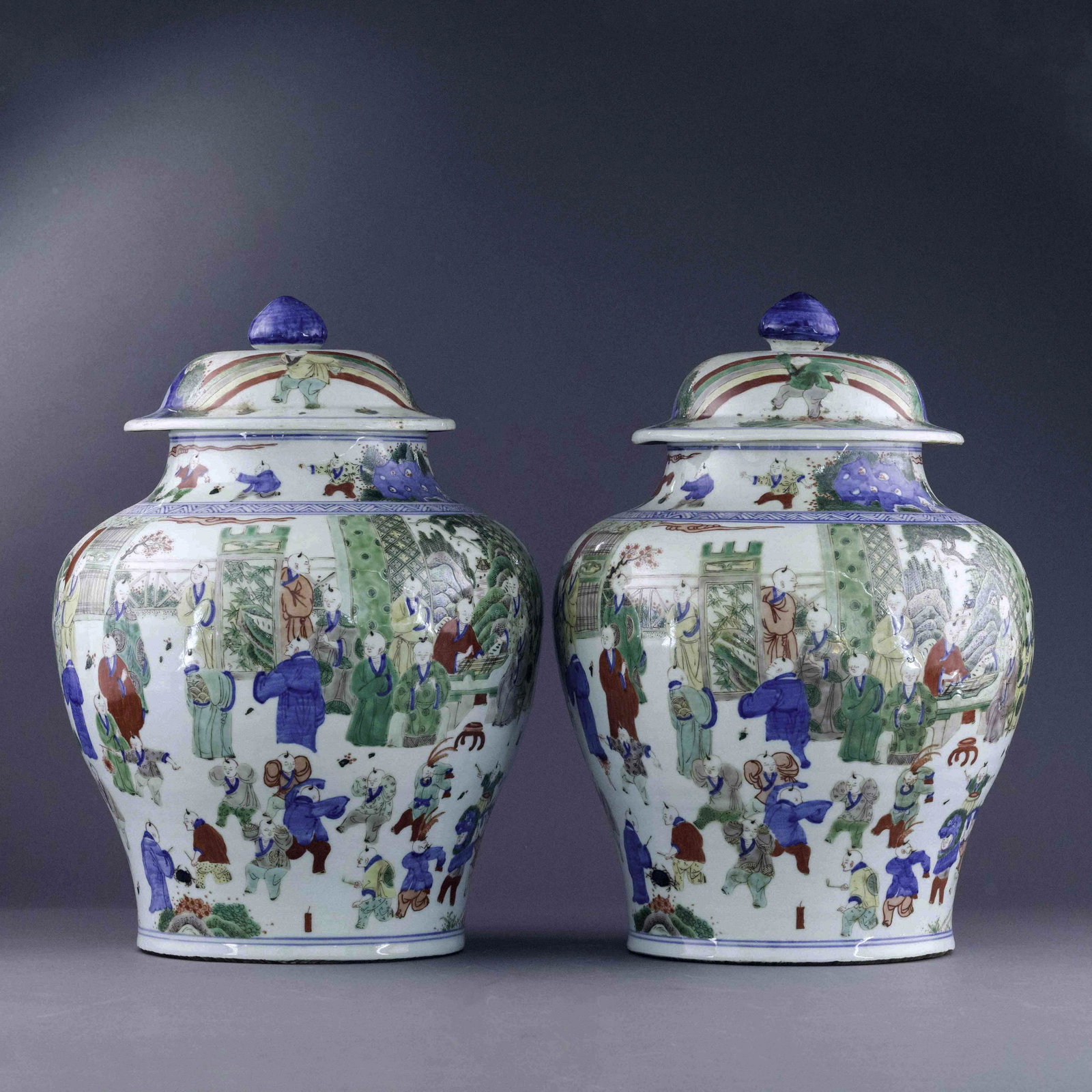 QING WUCAI HUNDRED BOYS GENERAL HELMET JAR: Measurements: 17.375in H x 12.875in W x 12.875in D Chinese Qing Dynasty Period, Wucai hundred boys general helmet jars. The porcelain potted in jar shape, having thick potted body, sturdily potted in 