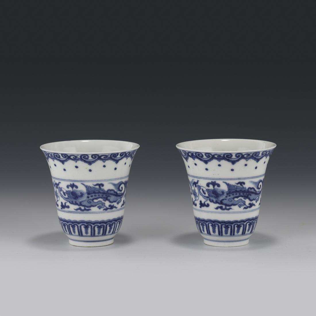 A PAIR OF BLUE & WHITE MHYTICAL BEAST CUPS (1 of 6)