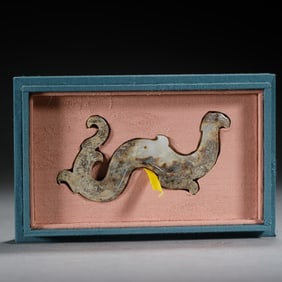 A CARVED JADE DRAGON
