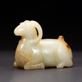 JADE CARVING OF A RECLINING SHEEP