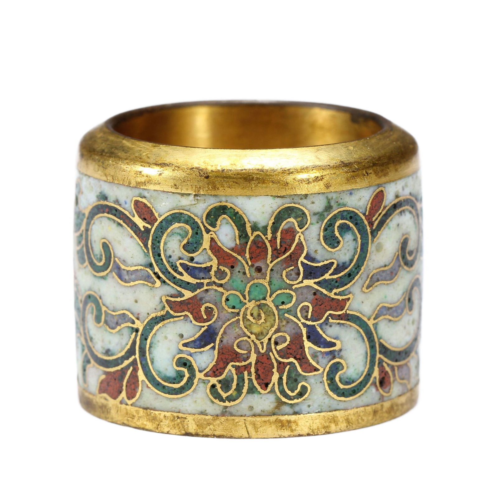 A CLOISONNE THUMB RING: Measurements: Diam. 3? cm. H. 2.5 cm. This is a cloisonn? thumb ring. Cloisonn?, also known as copper - body wire - inlay enamel, is crafted by using copper wires to form patterns on a copper base, fo