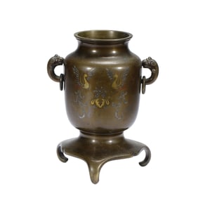 ORNATE COPPER VASE WITH MYTHICAL MOTIFS
