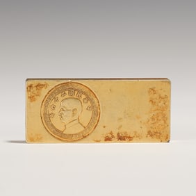 A SILVER - GILDED COIN