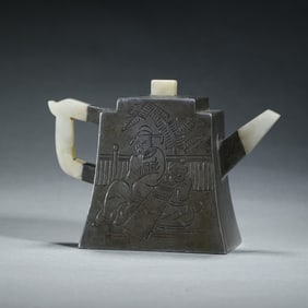 UNIQUE - SHAPED TEAPOT WITH ENGRAVED FIGURES