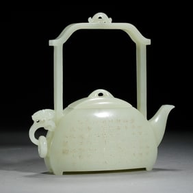 JADE TEAPOT WITH INSCRIPTIONS AND DRAGON - SHAPED HANDLE