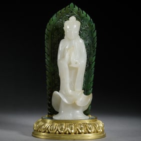 JADE BUDDHIST STATUE WITH GILDED BASE AND GREEN BACK PANEL