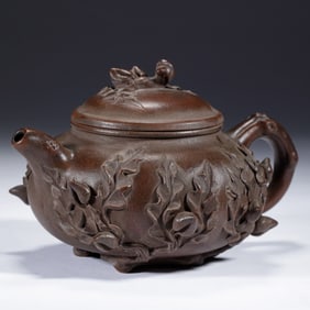 PURPLE SAND TEAPOT WITH CARVED DECORATIONS