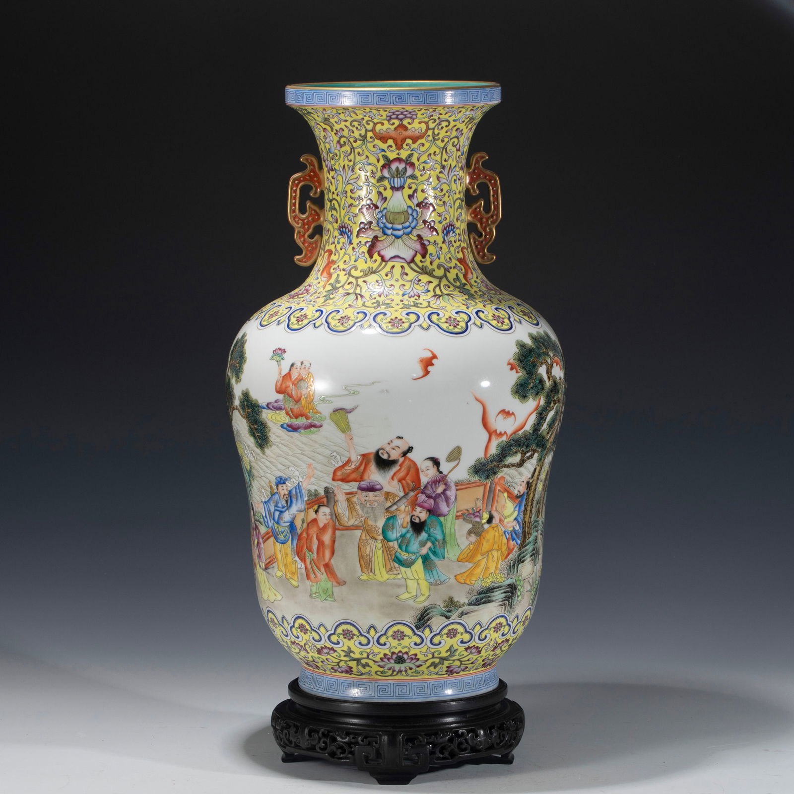 CHINESE QIANLONG FAMILLE ROSE BOTTLE VASE: Dimensions: Length: 29 cm, Width: 29 cm, Heigth: 51.3 cm Chinese Qianlong Famille Rose Large Bottle Vase On Hardwood Stand. Potted in a amphora shaped vase, large, thick and tall, globular body, sligh