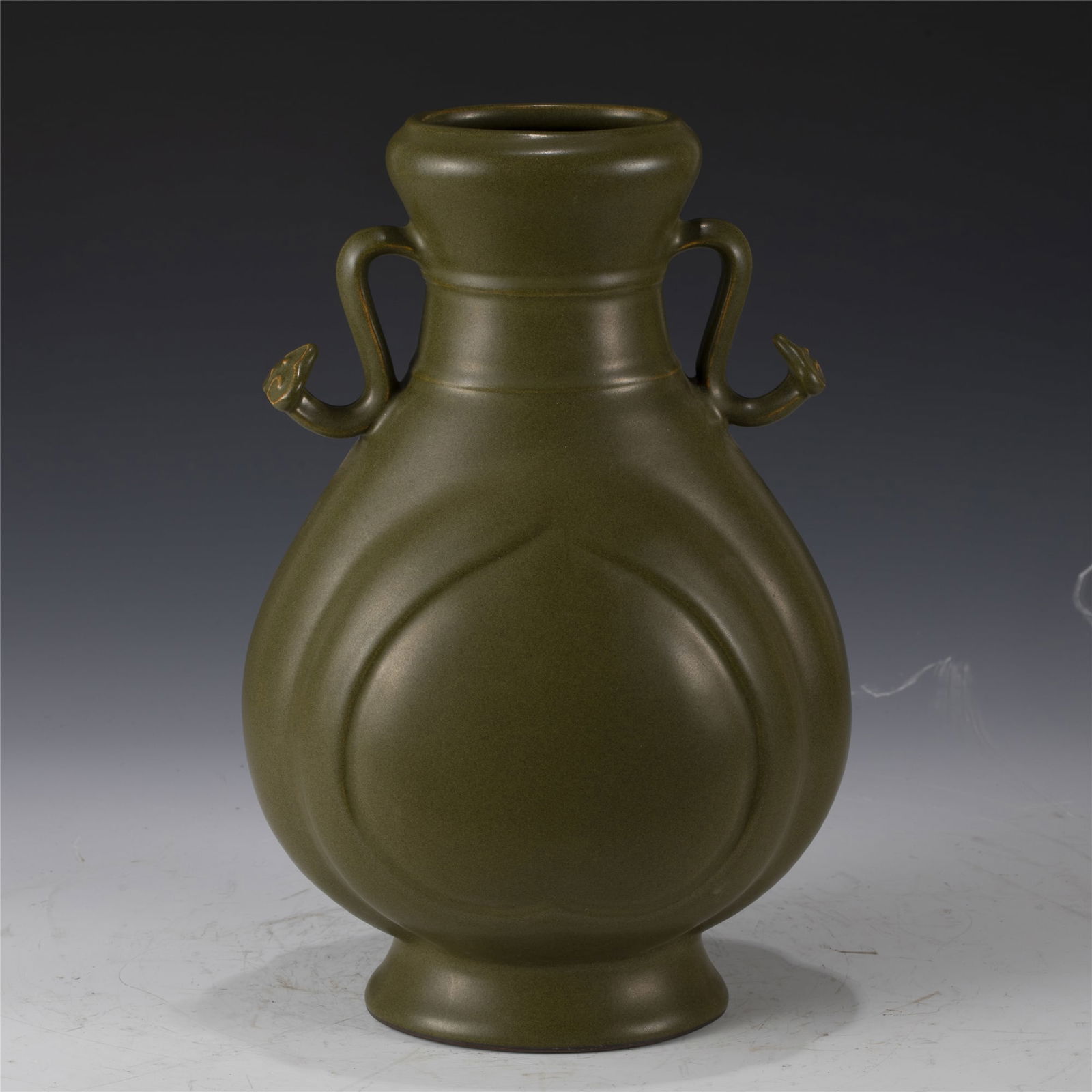 QING QIANLONG FAMILLE ROSE LOTUS AMPHORA VASE: Dimensions: Width: 15.4cm, Height: 28.8cm. Chinese Qing Dynasty Qianlong Famille Rose Lotus Porcelain Amphora Vase. Potted in large shape vase, thick and tall, cylindrical body, emerging archaic drago
