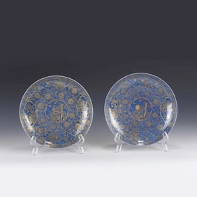 PAIR OF GOLD OVER BLUE GLAZE FLORAL PLATES