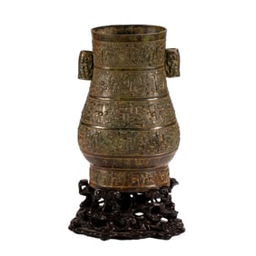 BRONZE VASE WITH PIERCED HANDLES