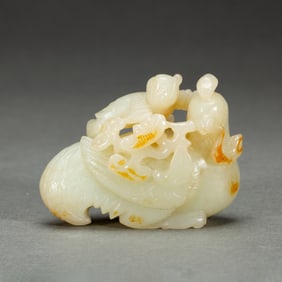 JADE CARVING OF BOYS RIDING A PHOENIX - LIKE BIRD