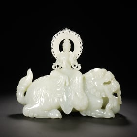 WHITE JADE CARVING OF MANJUSRI BODHISATTVA RIDING A LION