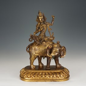 GILT - BRONZE STATUE OF MANJUSRI BODHISATTVA RIDING AN ELEPHANT