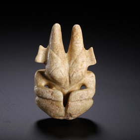 JADE CARVING WITH UNIQUE SHAPE