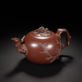 YIXING CLAY TEAPOT WITH NATURAL - STYLE CARVINGS
