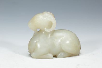 WHITE JADE CARVING OF RECLINING GOAT