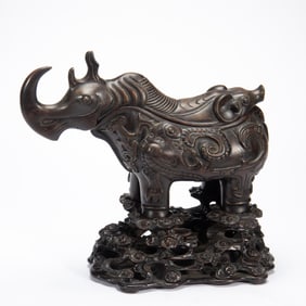 AGARWOOD MYTHICAL BEAST SCULPTURE WITH INTRICATE PATTERNS