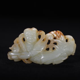 JADE CARVING PENDANT OF A CHILD HOLDING A FISH