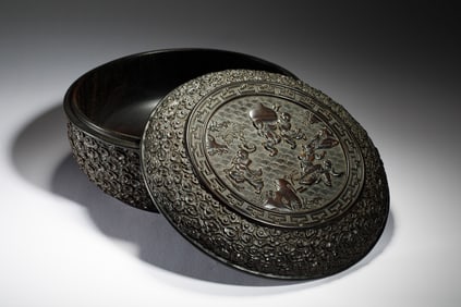 CIRCULAR WOODEN BOX WITH INTRICATE CARVED LID