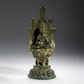 GILT BRONZE DEITY STATUE WITH ORNATE AUREOLE