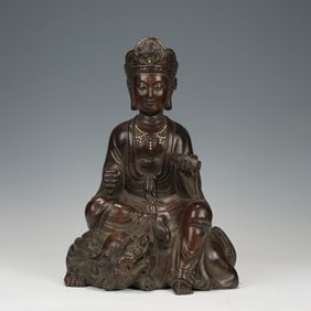 WOODEN DEITY SCULPTURE SEATED ON MYTHICAL BEAST
