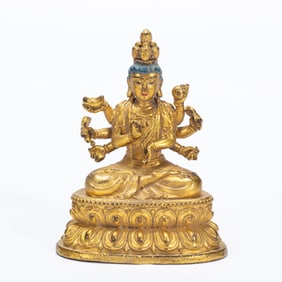 GILT - BRONZE STATUE OF A MULTI - ARMED BUDDHIST DEITY