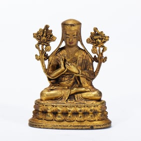 GILT - BRONZE STATUE OF A BUDDHIST FIGURE