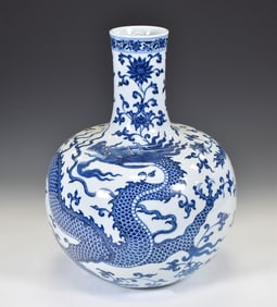 QING DYNASTY YONGZHENG BLUE AND WHITE DRAGON CELESTIAL VASE