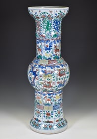 CHINESE WUCAI GU-FORM VASE WITH DEER & IMMORTALS’ EMBLEMS