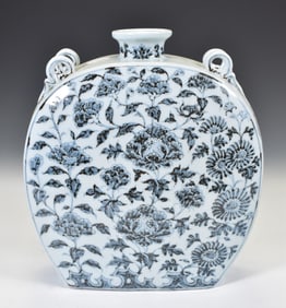 A CHINESE BLUE AND WHITE MOONFLASK WITH PEONY SCROLLS