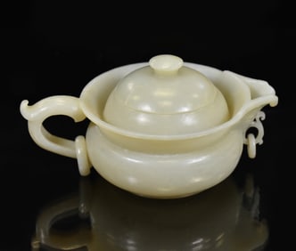 CHINESE WHITE JADE LIDDED VESSEL WITH LOOSE RINGS
