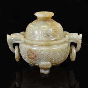 A FINELY CARVED WHITE JADE TRIPOD CENSER (DING)