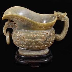 ARCHAISTIC CARVED JADE POURING VESSEL (YI)
