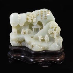 AN EXCEPTIONAL WHITE JADE CARVED MOUNTAIN LANDSCAPE