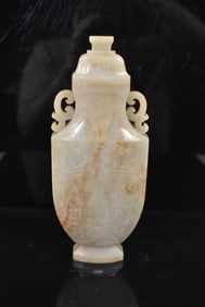 A CELADON-WHITE JADE ARCHAISTIC VASE