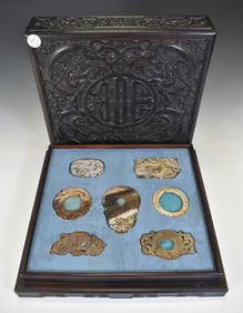 A COLLECTION OF 7 ARCHAISTIC JADE ORNAMENTS IN BOX