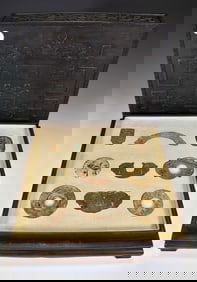 A COLLECTION OF 8 ARCHAISTIC JADE ORNAMENTS IN BOX