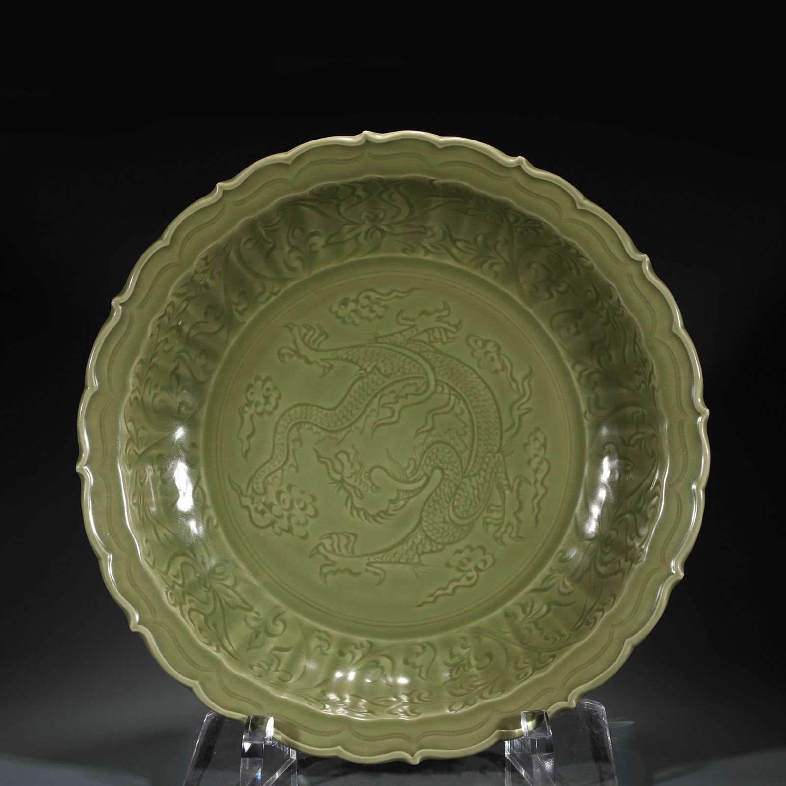 MING LONGQUAN CELADON CHARGER: Dimensions: Width: 51cm, Height: 10cm Chinese Ming Dynasty Longquan Porcelain Plate. The plate has a broad wide central interior, flori rounded mouth lip, thick and large, raised on correspondence foo