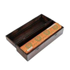 A HUANGHUALI COFFIN BOX WITH SILK BROCADE