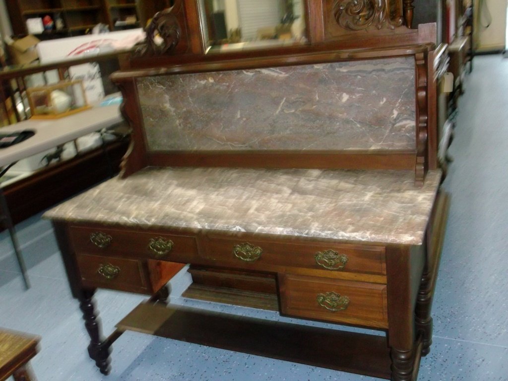 Walnut Sideboard With Marble Top: Walnut sideboard with marble top. Approximately 1930's to 1940's. 48"W x 21.5"D x 66" H. Excellent condition. Update: This Piece has a Chip on the back corner of the marble.