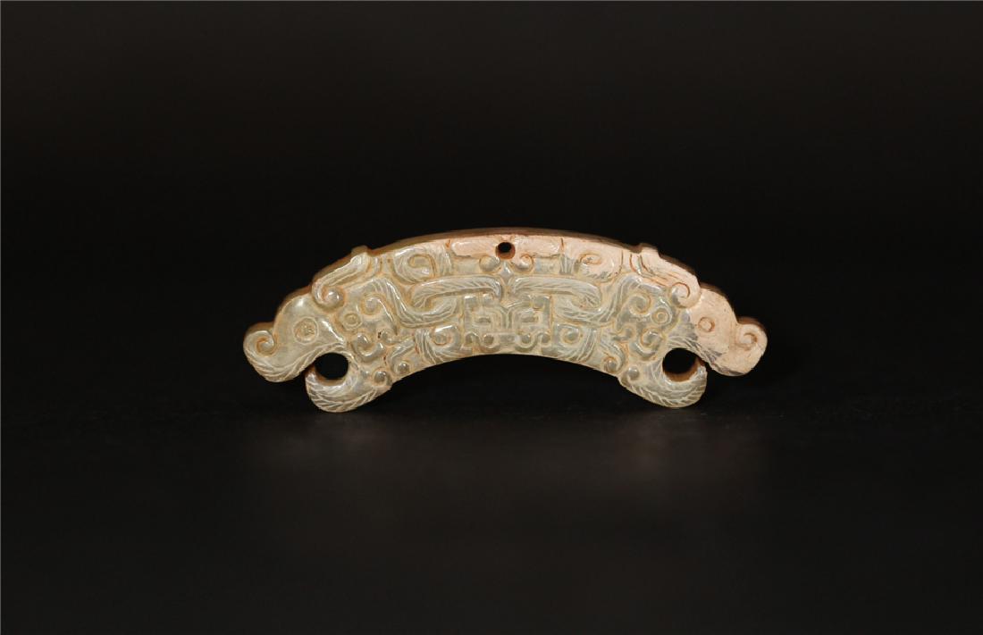 A JADE DRAGON HUANG ARCHED PENDANT              HAN (1 of 4)