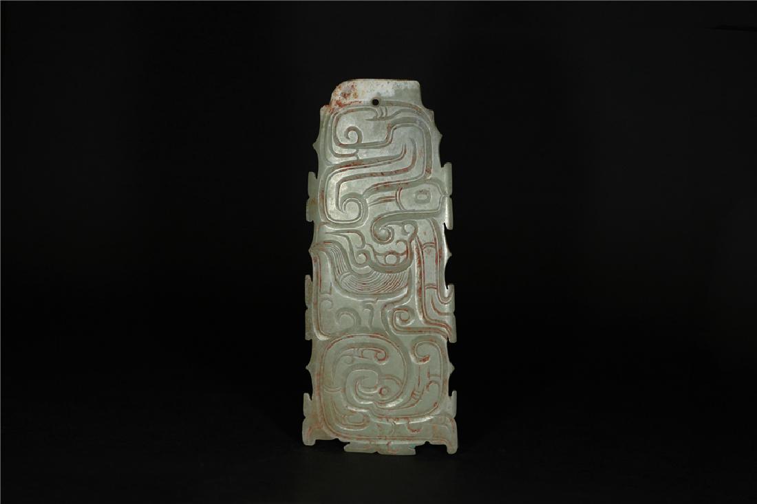 A JADE CARVED FIGURE PENDANT (1 of 6)
