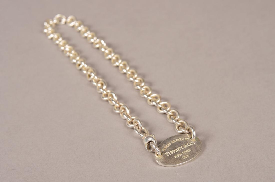 Tiffany & Co. (Please return to) Sterling Silver (1 of 4)