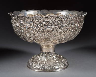 American Sterling Silver Repousse Bowl: American Sterling Silver Repousse Decorated Bowl, With Floral And Shell Design, Having Hallmarks Reading F.N&S Ltd Weight: 1042 Grams Dimensions: Height: 7 3/4" Width: 11" Depth: 11"