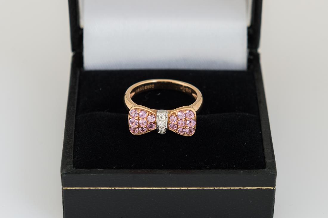 18k Gold Ring Pink Saphire & Diamond Bow: Gold Ring with Pink Saphire and Diamond Bow Size 4.5, Marked inside with 18k
