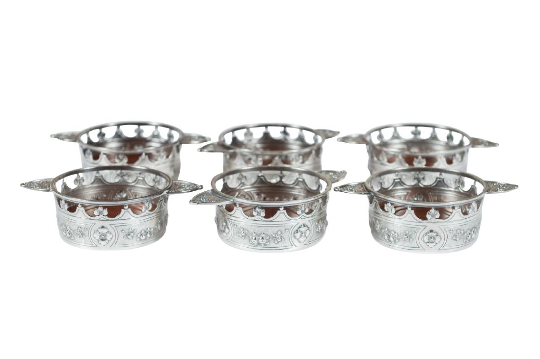 Six Sterling Silver Coasters: Six Sterling Silver Coasters with original wood inserts Dimensions: Height: 1 3/4" Width: 4 3/4" Depth: 3 1/4"